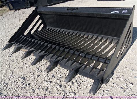 heavy duty skid steer rock buckets|tomahawk attachments for skid steers.